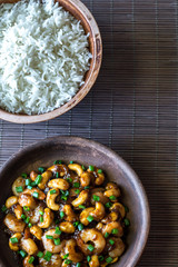 Portion of cashew shrimp stir-fry with rice