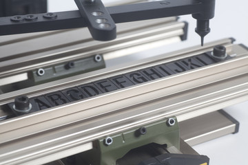 Engraving device pantograph with letterpress alphabet