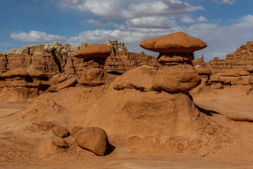 Fototapeta na wymiar Sandstone hoodoo formations in Goblin Valley State Park in Utah desert and American Southwest
