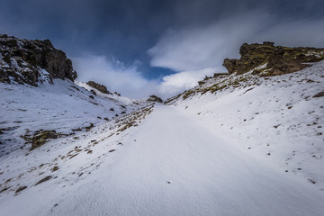 Fototapeta na wymiar Icelandic wilderness - May 05, 2018: Wild Snow covered landscape of Iceland