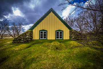 Fototapeta na wymiar Hof - May 05, 2018: Turf church in the town of Hof, Iceland