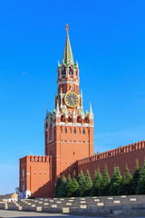 Fototapeta na wymiar Tribunes on the background of Spasskaya tower of Moscow Kremlin on Red square