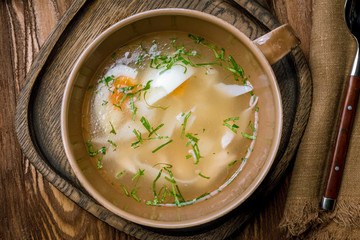 Chicken soup bouillon in a plate