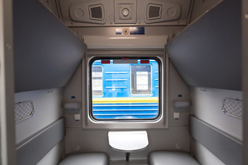 classic interior of sleeping car of train. interior of compartment car. Passenger train car. Sleeping car of passenger train