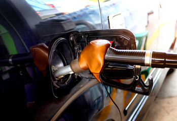 fill fuel, colorful fuel gasoline dispenser  background energy crisis