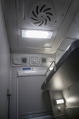 Fototapeta premium classic interior of sleeping car of train. interior of compartment car. Passenger train car. Sleeping car of passenger train