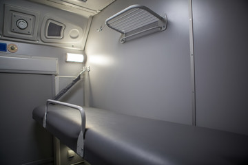 classic interior of sleeping car of train. interior of compartment car. Passenger train car. Sleeping car of passenger train