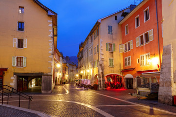 Nice street Rue Sainte-Claire in Old Town of Annecy at rainy night, France
