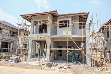 house under construction with autoclaved aerated concrete block structure at building site