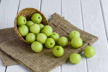 Indian gooseberry on wooden table