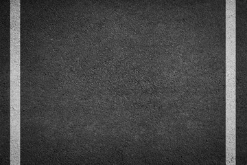 Fototapeta premium background texture of rough asphalt white line
