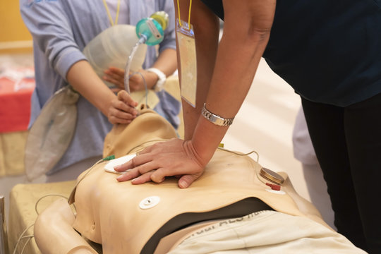 A trainee perform chest compression with another nurse ventilate by ambubag via endotracheal tube on a mannequin