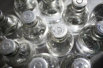bottles with solutions on the medical table