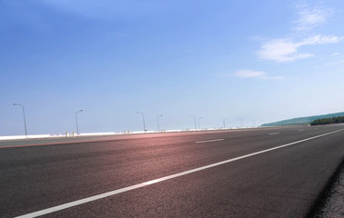Road asphalt and sky background