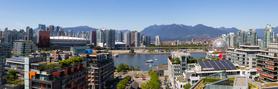 Downtown Vancouver, British Columbia, Canada - May 22, 2018: Aerial panoramic view of the modern city during a sunny day.