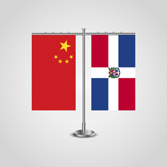 Table stand with flags of China and Dominican Republic.Two flag. Flag pole. Symbolizing the cooperation between the two countries. Table flags