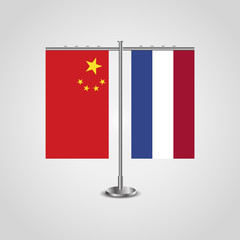 Table stand with flags of China and Netherlands.Two flag. Flag pole. Symbolizing the cooperation between the two countries. Table flags