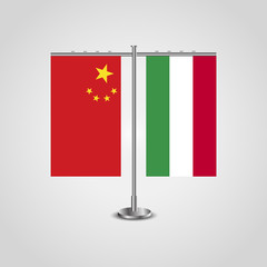 Table stand with flags of China and Hungary.Two flag. Flag pole. Symbolizing the cooperation between the two countries. Table flags