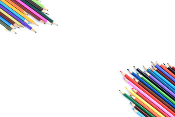 Fototapeta premium Colorful pencils, pastel and gouache isolated on white background with copy space. Drawing concept.