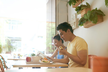 Breakfast of young couple