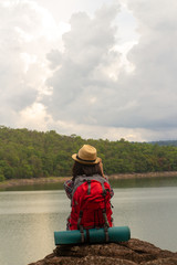 Young woman watching and Take a photo landscape,.backpacker.