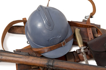 french military helmet of the First World War with equipment on white