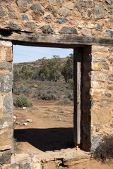 Kanyaka South Australia, arid landscape through doorway of abandoned building