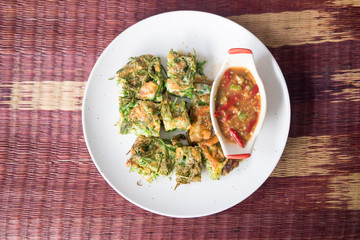 Climbing wattle (Cha-om) omelette and  shrimp paste chili dip