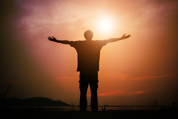 Fototapeta premium Christian man with open hands worship christian. Eucharist Therapy Bless God Helping Repent Catholic Easter Lent Mind Pray. Christian concept background.