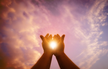 Fototapeta premium Christian man with open hands worship christian. Eucharist Therapy Bless God Helping Repent Catholic Easter Lent Mind Pray. Christian concept background.