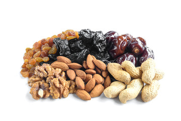 Dried fruits and nuts of raisin, prane, dates, walnuts, almonds and peanuts isolated on white background.