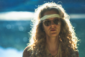 Hippie style girl with round glasses. Vintage style image