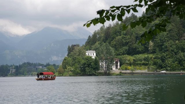 Traditional wooden boat, pletna on lake Bled