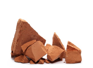 Shattered brick pieces isolated on white background