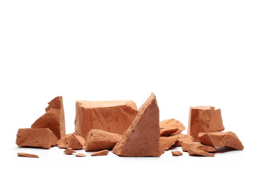Shattered brick pieces isolated on white background