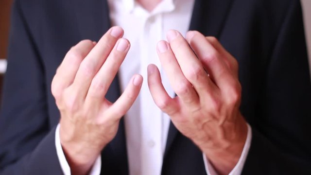 Attention gesture. Male hands