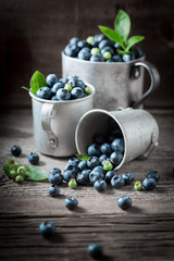 Closeup of blueberry on old wooden rustic floor