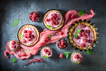 Homemade tarts with fresh raspberries and mascarpone