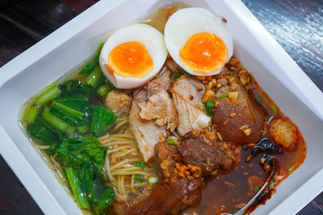Noodles soup with pork leg and egg