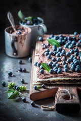 Tasty wafers with chocolate cream and fresh blueberries
