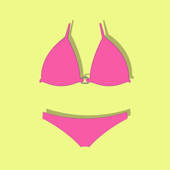 female swimsuit on a yellow background