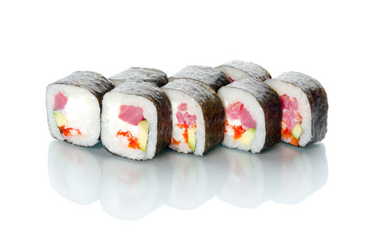 sushi, poppy rolls Tampopo on white background with reflection filling snow shrimp