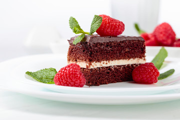 Chocolate cake with raspberry and mint.