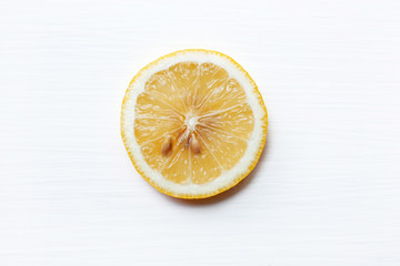 Fresh lemon slice  on  white.
