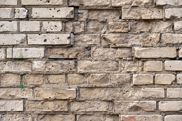 Texture of an old broken brick wall