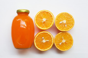  Orange juice on white background.  Top view