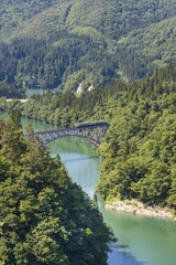 Tadami railway line and Tadami River in summer season at Fukushima prefecture.