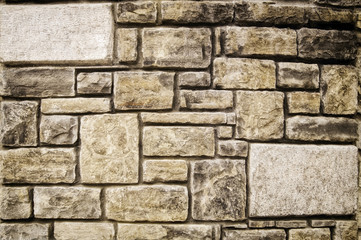 background image of a stone fence of different sizes