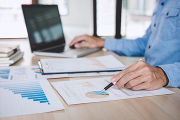 Businessman working analysis finance with calculate about cost on investment, planning data on...