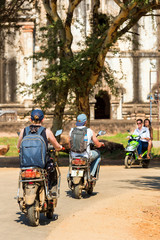 BAGAN, MYANMAR - DECEMBER 1, 2016: Mopeds on a city street. Vertical. Copy space for text.
